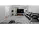 Inviting living room featuring a sleek fireplace and comfortable seating at 24031 E Hinsdale Pl, Aurora, CO 80016