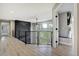 Modern loft area featuring a black accent wall and iron railing, offering scenic views at 24031 E Hinsdale Pl, Aurora, CO 80016