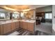 Bathroom featuring a double vanity, and an adjoining bedroom at 14962 Williams St, Thornton, CO 80602