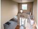 Entryway with decor and bright sunlight shining through the front door window at 14962 Williams St, Thornton, CO 80602