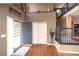 Welcoming foyer with hardwood floors, staircase, and ample closet space at 14962 Williams St, Thornton, CO 80602