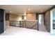 Carpeted landing on the upper level with views of the staircase and hallway at 14962 Williams St, Thornton, CO 80602