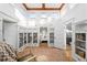 Bright library with built-in shelving and stained glass accents at 2550 W 43Rd Ave, Denver, CO 80211