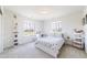 Charming bedroom featuring natural light from windows and a cozy feel at 4918 Preserve Pl, Firestone, CO 80504