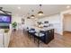 Spacious kitchen overlooking the living room with large kitchen island with seating at 4918 Preserve Pl, Firestone, CO 80504