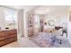 Bright home office space with two windows and ample storage at 4918 Preserve Pl, Firestone, CO 80504