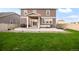 This house has a vast lawn, covered patio, and ample seating perfect for outdoor entertaining at 6922 Vermillion St, Frederick, CO 80530