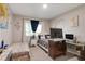 Cozy bedroom with two beds, neutral colors, and natural light from the window at 6922 Vermillion St, Frederick, CO 80530