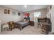 Cozy bedroom featuring comfortable bed, desk, and playful decor at 6922 Vermillion St, Frederick, CO 80530