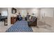 Cozy living room with comfortable seating, stylish rug, and relaxing ambiance at 6922 Vermillion St, Frederick, CO 80530