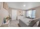 A comfortable primary bedroom featuring neutral colors, lots of light and carpeted floors at 6922 Vermillion St, Frederick, CO 80530