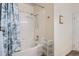 Clean bathroom with a shower/tub, and a linen closet at 8465 S Holland Way # 205, Littleton, CO 80128