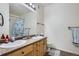 Bathroom with double sinks, shower/tub combo and plenty of counter space at 8465 S Holland Way # 205, Littleton, CO 80128