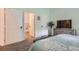 Bedroom with ensuite bathroom access and plenty of closet space at 8465 S Holland Way # 205, Littleton, CO 80128