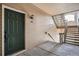 Private entry with exterior door and interior stairs at 8465 S Holland Way # 205, Littleton, CO 80128
