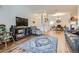 Bright living room with hardwood floors and open layout at 8465 S Holland Way # 205, Littleton, CO 80128