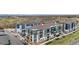 Aerial view showcases the modern apartment complex with its landscaping and parking at 9287 Twenty Mile Rd # 204, Parker, CO 80134