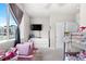 Bright bedroom features bunk beds, soft carpet, large windows and a ceiling fan at 9287 Twenty Mile Rd # 204, Parker, CO 80134