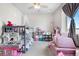 Bright bedroom features bunk beds, soft carpet, large windows and a ceiling fan at 9287 Twenty Mile Rd # 204, Parker, CO 80134
