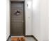 Stylish front door with decorative wreath, smart lock, and the unit number at 9287 Twenty Mile Rd # 204, Parker, CO 80134