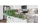 Modern kitchen with granite countertops, stainless steel appliances, and stylish fixtures and finishings at 9287 Twenty Mile Rd # 204, Parker, CO 80134