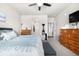 Spacious main bedroom featuring ensuite bath, ceiling fan and large windows at 9287 Twenty Mile Rd # 204, Parker, CO 80134