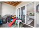 Covered patio, accessed through sliding glass doors, has room for entertaining and grilling at 9287 Twenty Mile Rd # 204, Parker, CO 80134