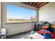 Covered patio with neighborhood views has room for entertaining and barbecuing at 9287 Twenty Mile Rd # 204, Parker, CO 80134