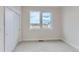 Bedroom with natural light and carpet at 5575 Moosehead Cir, Longmont, CO 80503