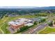 Aerial view showcases the community layout, including a large park, school and surrounding neighborhood at 142 S Fillmore Ave, Louisville, CO 80027