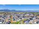 Breathtaking aerial view showcases a vibrant community with mountain views and modern homes at 936 Sunflower St, Louisville, CO 80027