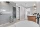 Contemporary bathroom with glass shower, freestanding tub, and stylish vanity at 936 Sunflower St, Louisville, CO 80027