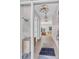Bright foyer showcasing chandelier lighting, hardwood floors, and stylish decor at 936 Sunflower St, Louisville, CO 80027