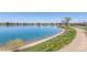 Scenic view of a lake with trees and a walking path along the shore at 936 Sunflower St, Louisville, CO 80027