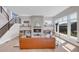 Elegant living room featuring fireplace, comfortable seating, and natural light at 936 Sunflower St, Louisville, CO 80027