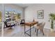 Bright home office with large windows, modern desk, and comfortable seating area at 936 Sunflower St, Louisville, CO 80027