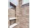 The shower features a built-in niche and modern horizontal tiling at 936 Sunflower St, Louisville, CO 80027