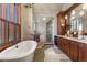 Stunning bathroom boasting a soaking tub, walk-in shower and dual sink vanity at 220 Cottonwood Cir, Breckenridge, CO 80424