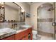 Beautiful bathroom featuring granite countertops, a glass enclosed shower and decorative wrought iron at 220 Cottonwood Cir, Breckenridge, CO 80424