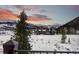 Breathtaking view of a luxury home with snowy landscape and mountain views at 220 Cottonwood Cir, Breckenridge, CO 80424