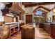 Spacious kitchen features custom cabinetry, stainless steel appliances, and a center island at 220 Cottonwood Cir, Breckenridge, CO 80424