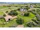 Expansive property features a home, barn, and paddock, all nestled within a vast landscape with distant mountain views at 225 Briscoe Ln, Castle Rock, CO 80109