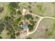 Expansive property featuring a home with a long driveway and landscaped yard, complete with an outbuilding at 225 Briscoe Ln, Castle Rock, CO 80109