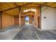 Spacious barn interior with natural light, wooden construction, and open stalls at 225 Briscoe Ln, Castle Rock, CO 80109