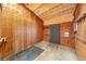 Interior of barn featuring wooden walls, concrete floor, and insulated ceiling at 225 Briscoe Ln, Castle Rock, CO 80109
