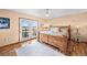 Bedroom with french doors to deck and beautiful scenic views at 225 Briscoe Ln, Castle Rock, CO 80109