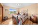 Cozy bedroom featuring a decorative bed frame and scenic views at 225 Briscoe Ln, Castle Rock, CO 80109