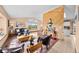 Inviting living room features wood floors, vaulted ceilings, and large windows showcasing scenic views at 225 Briscoe Ln, Castle Rock, CO 80109