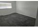 Bedroom with a large window and wall heater at 14500 E 2Nd Ave # 209A, Aurora, CO 80011