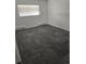 Bedroom with neutral walls, carpet, natural light from window creating a calming atmosphere at 14500 E 2Nd Ave # 209A, Aurora, CO 80011